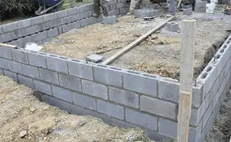 Professionals building a foundation with blocks in Tempe, AZ