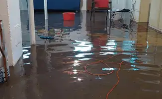 Basement with boiler, cabinets and washing machine completely flooded in Tempe, AZ